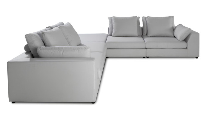 Moderna sofá de esquina en forma de L de material blanco