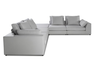 Moderna sofá de esquina en forma de L de material blanco