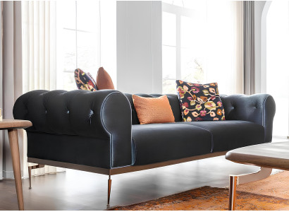 Sofá Chesterfield para tres personas en tela azul