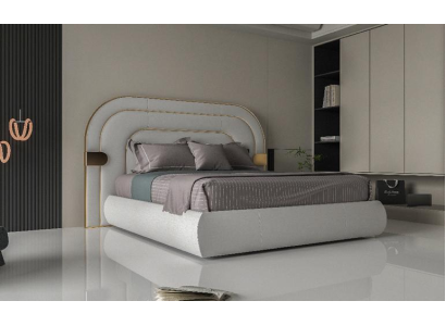 Cama gris lujosa con acentos dorados en diseño moderno y cabecera acolchada
