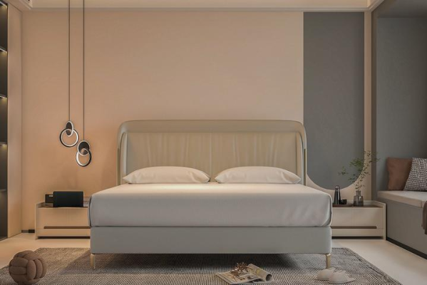 Moderna cama de lujo en gris con un elegante cabecero dorado