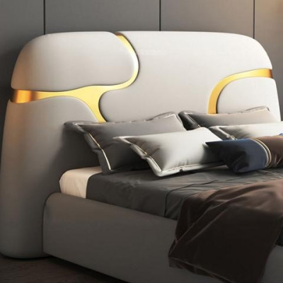 Moderna cama tapizada en gris y oro