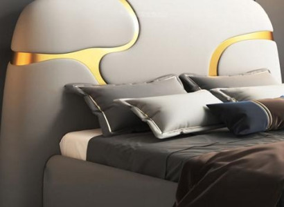 Moderna cama tapizada en gris y oro