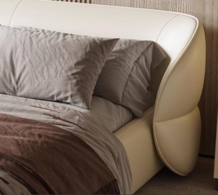 Moderno sofá tapizado con función de cama en elegante tela gris