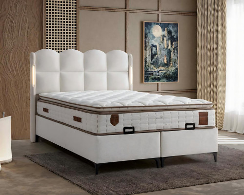 Cama blanca elegante con colchón de diseño moderno