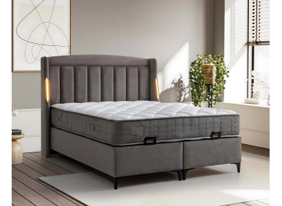 Cama gris elegante con colchón de textil y madera