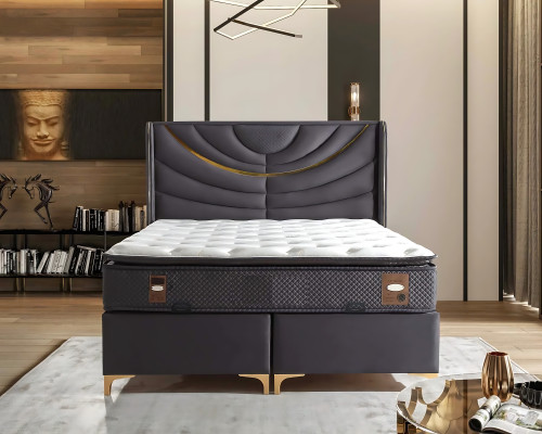 Elegante cama gris con colchón de textil y madera