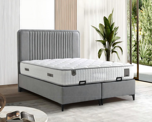 Elegante cama gris con colchón de textil y madera