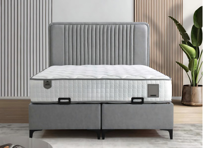 Elegante cama gris con colchón de textil y madera
