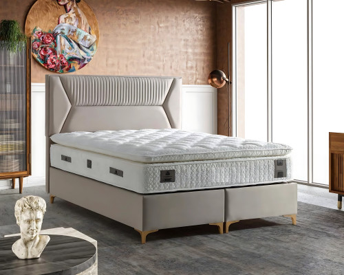 Cama elegante beige con colchón de textil y madera