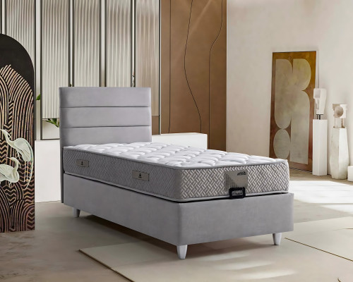Elegante cama gris con colchón de textil y madera