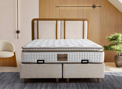 Colores claros y neutros hacen que la cama con colchón sea versátil.