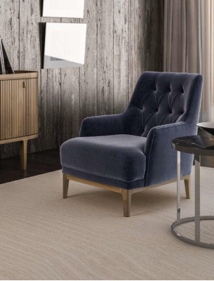 Sillón Chesterfield exclusivo azul para sala de estar, de un solo asiento, con armazón de madera.