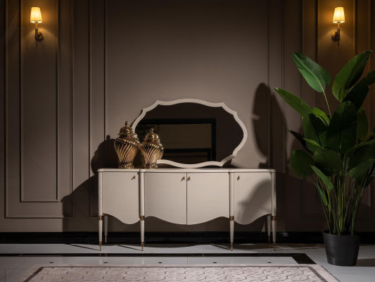 Conjunto de salón de 4 piezas: sillón, mesa auxiliar, aparador y espejo en color beige.
