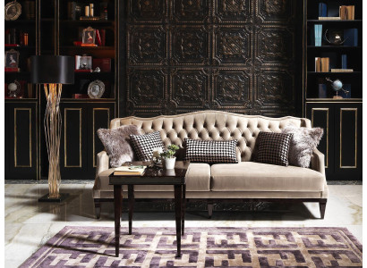 Sofá Chesterfield de tres plazas elegante en gris - muebles tapizados atemporales para tu hogar.