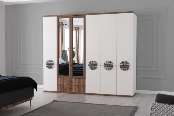 Moderno conjunto de dormitorio: cama doble de diseño, armario, mesitas de noche.