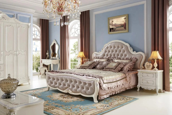 Conjunto de dormitorio clásico Chesterfield de madera con elementos de cuero.