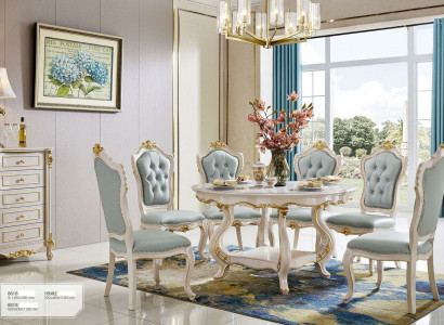 Ambiente clásico de comedor en azul claro Mesa redonda de madera con x6 sillas de respaldo Chesterfield.