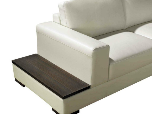 Gran sofá de cuero, cojines de asiento esquineros con iluminación.