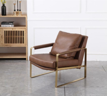 Sofá decorativo tapizado de diseñador para televisión en la sala de estar.