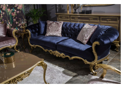 Sofá de tres plazas Chesterfield en un lujoso color azul para la sala de estar.