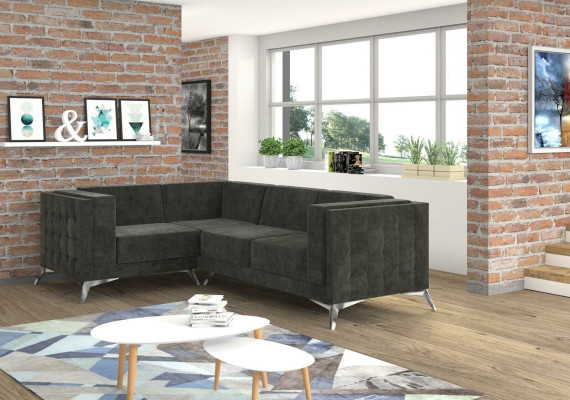 Sofá esquinero Chesterfield en forma de L de diseño de tela con asiento acolchado.