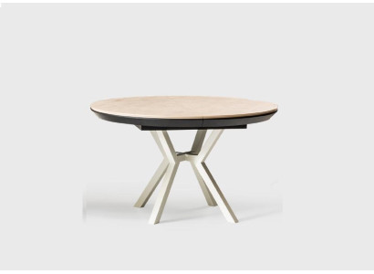 Mesa de comedor moderna extensible redonda de madera beige.