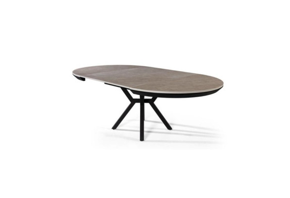 Mesa de comedor redonda extensible en madera gris.