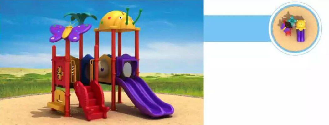 Zona de juegos infantiles con tobogán y columpios