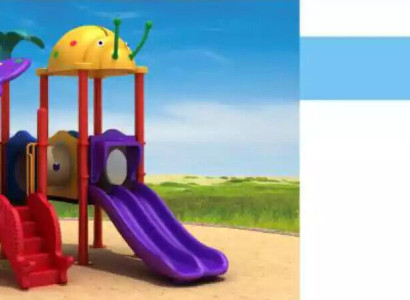 Zona de juegos infantiles con tobogán y columpios