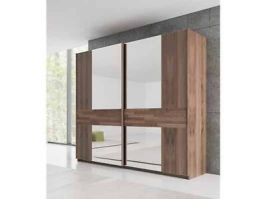Armario de madera de lujo con diseño moderno para el dormitorio con puertas de cristal.