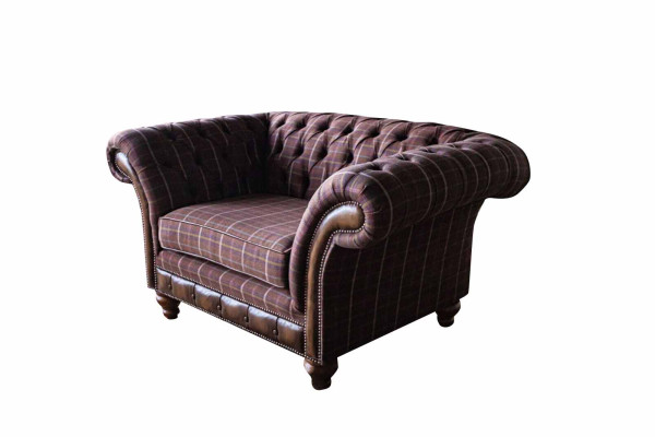 Chesterfield sofá de 1 asiento tapizado de tela de lujo.
