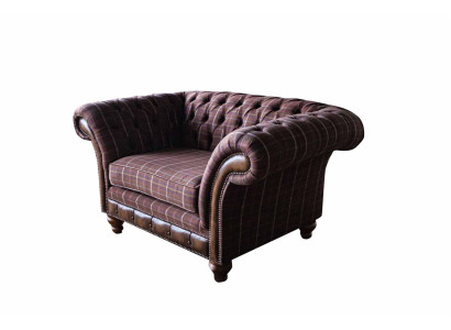 Chesterfield sofá de 1 asiento tapizado de tela de lujo.