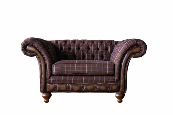 Chesterfield sofá de 1 asiento tapizado de tela de lujo.