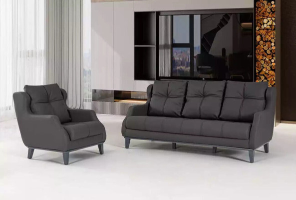 Sofá negro Set de lujo moderno de dos piezas con asientos acolchados - un sillón y un sofá de dos plazas.