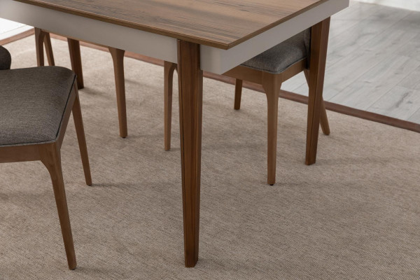 Gran mesa marrón para comedor. Muebles de madera de diseñador para comedor.