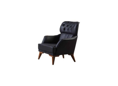 Sillón Chesterfield negro de lujo de una plaza para sala de estar.