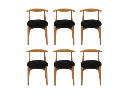Comedor de lujo de madera con 6 sillas marrones sin apoyabrazos diseño de silla acolchada.