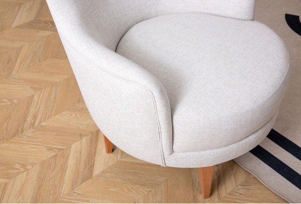 Sillón de tela blanco Estiloso sillón de diseño de una plaza para la sala de estar.