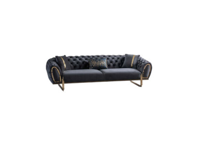 Sofá tapizado negro, diseño Chesterfield para sala de estar.