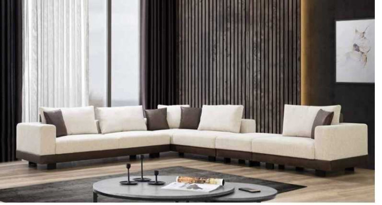 Sofá de esquina de lujo para la sala de estar en forma de L, tapizado en tela, con estructura de madera, con estilo.