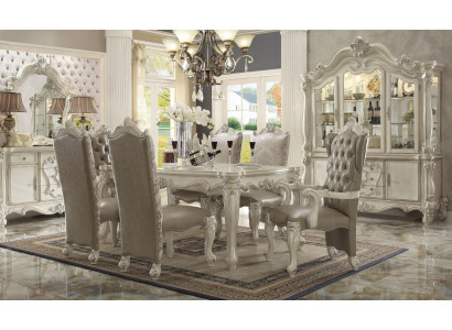 Juego de comedor blanco de diseñador: mesa de comedor, sillas, cómoda y espejo.