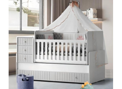 Elegante cama infantil acogedora para un sueño reparador de lujo en gris.