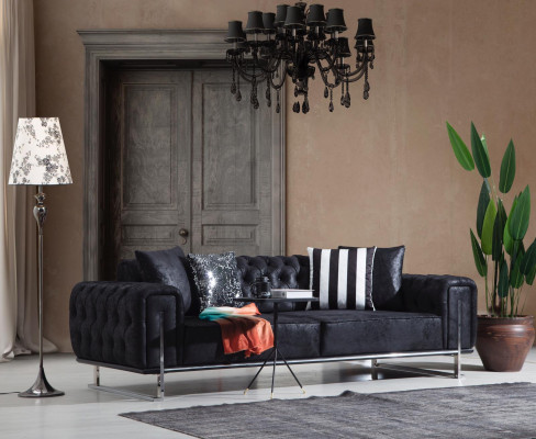 Sofá de tres plazas diseño Chesterfield de lujo para salón.