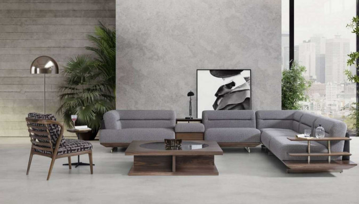 Moderno conjunto de sala de estar, sofá esquinero en forma de L, sillón con mesa de centro, diseño de lujo.