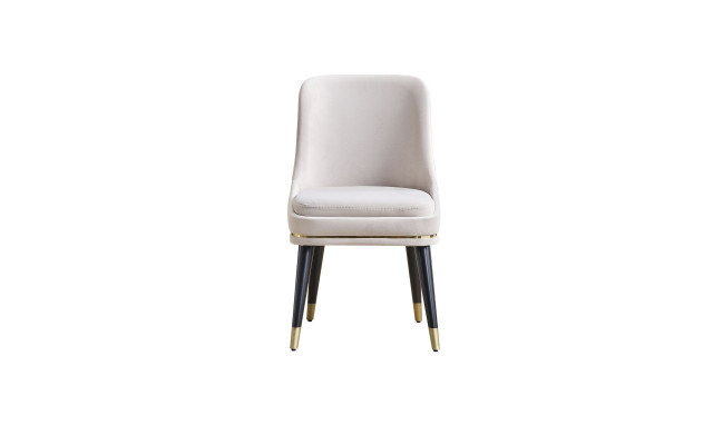 Silla de comedor moderna blanca de una plaza con pies elegantes.