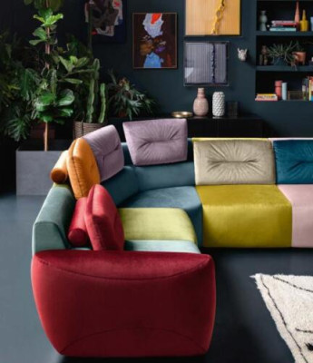 Sofá de esquina de tela con diseño de salón esquinero. Sofá italiano de Alfitalia.