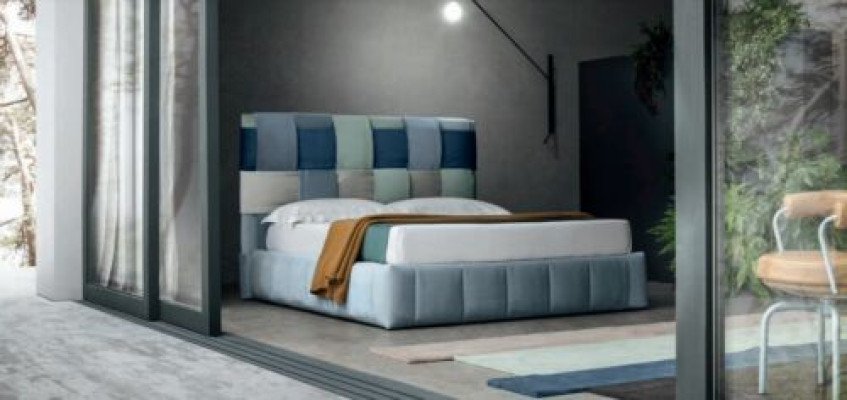 Modernas camas de lujo tapizadas en textil. Cama de dormitorio de alta calidad. Muebles italianos.