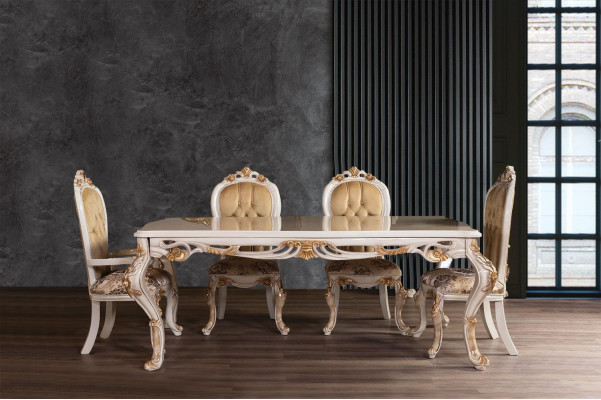 Muebles clásicos para el comedor en color beige. Mesa de comedor diseñada con sillas tapizadas estilo Chesterfield.