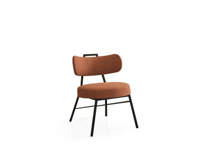 Moderna silla redonda con asiento de materiales naturales con tapizado de tela.